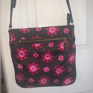 Michael Kors black and pink satchel purse.